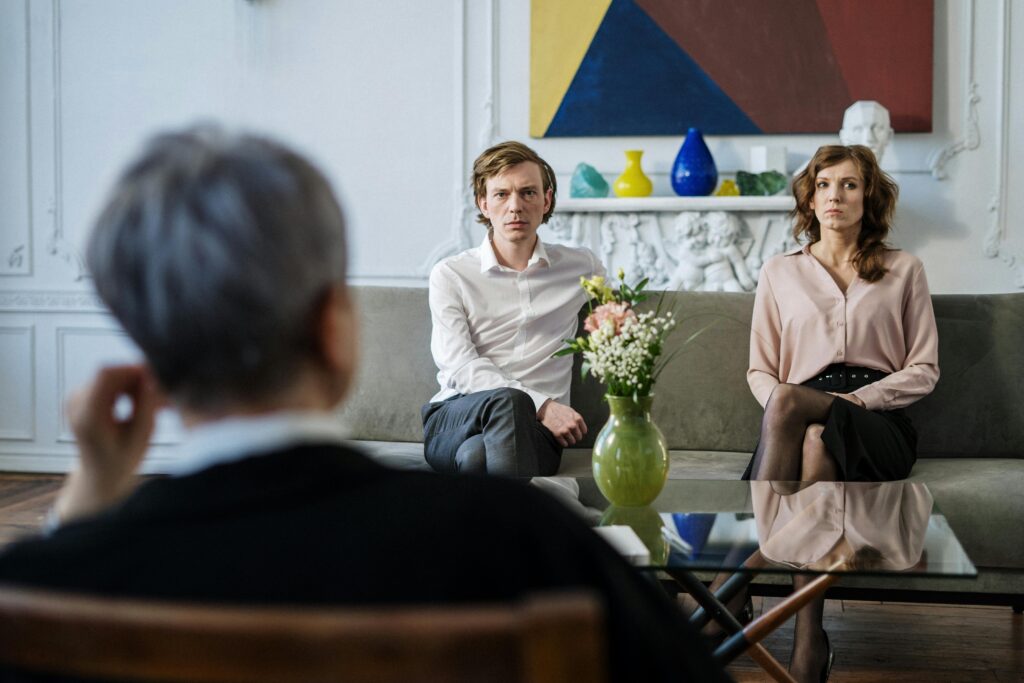 couple in therapy getting furious and colluding